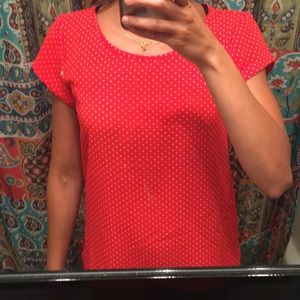 Red shirt with white peas